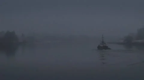 A boat in the mist on the river at twilight Stock Footage 59140730