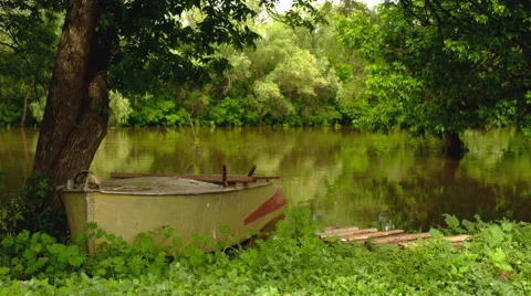 Boat moored on the banks of the river Stock-Footage 63748490