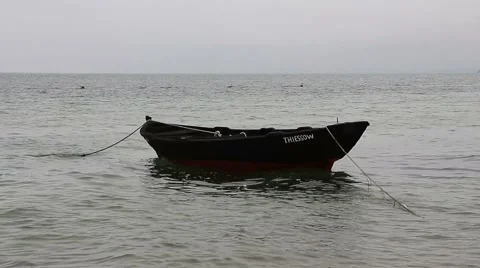 Boat moored on the coast Stock Footage 42678684