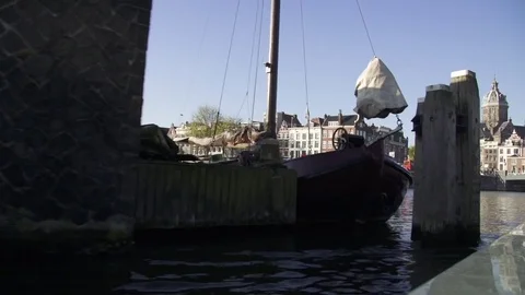 Boat moored at dock in Amsterdam Stock Footage 71535802