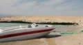 Boat Moored on an Island Shore HD Footage