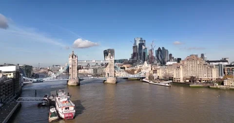 Boat moored at pier, Tower Bridge and futuristic skyscrapers Video stock 170916559