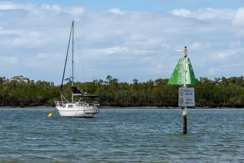 Boat moored up in the river Foto stock