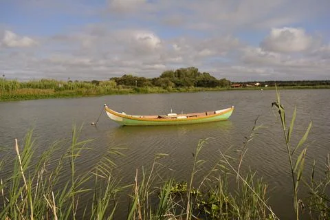 Boat moored on the river Stock Photos
