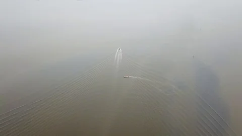 A boat move towards front and a boat move in reverse direction at Malaysia. Stock Footage 117403856