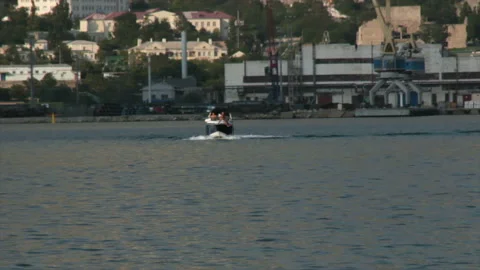 Boat moves from cargo harbor Stock-Footage 135402351