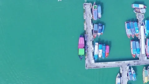 The boat is moving along the marina. Aerial photography Stock Footage