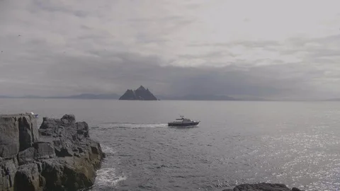 Boat Moving In Atlantic Ocean With Skellig Michael In Background Stock Footage 86067010