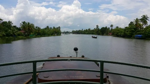 Boat moving on beautiful backwaters during monsoon in kerala, India Stock Footage 87072271