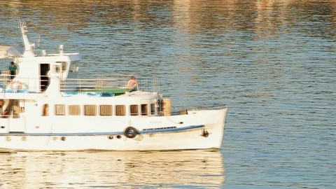 Boat moving in river Dnieper in the evening Stock Footage 71270595