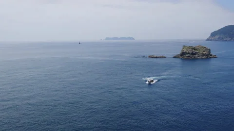 A boat moving on the sea, causing white foam_no sound_LT_VIDEO Stock Footage 137107073