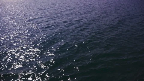 On the boat that is moving with Sunlight reflecting the sea surface. Stock Footage 119854553