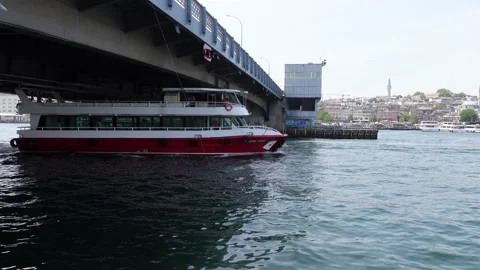 Boat Moving Under Galata Bridge in Istanbul (Turkey) Video stock 196618894