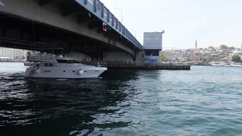 Boat Moving Under Galata Bridge in Istanbul (Turkey) Video stock 196619152