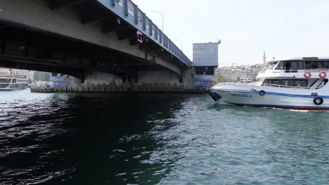 Boat Moving Under Galata Bridge in Istanbul (Turkey) Video stock 196619747