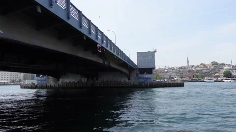 Boat Moving Under Galata Bridge in Istanbul (Turkey) Video stock 196622247
