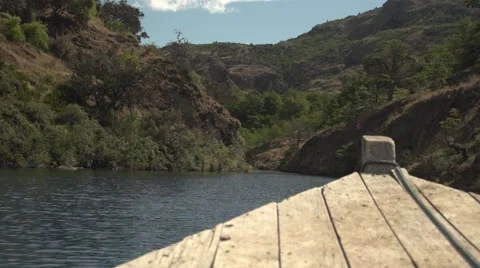 Boat navigating across a river 스톡 동영상 59516980