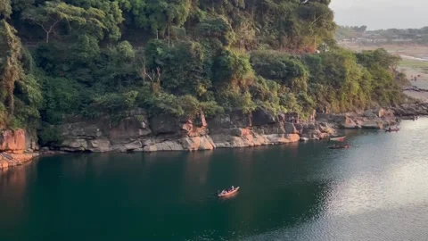 Boat navigating beautiful turquoise waters of Dawki River, India. Gimbal Stock-Footage 168675939