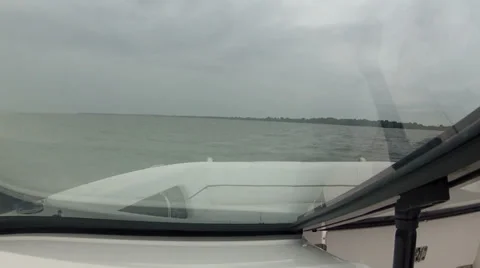 Boat navigating fast on a river Stock Footage 39831324