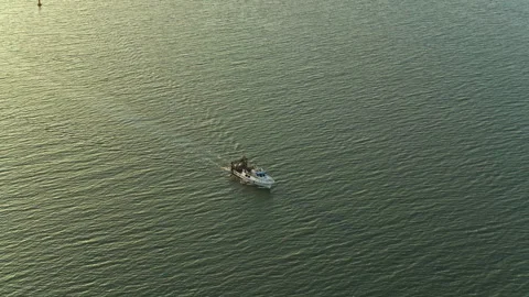Boat navigating over the ocean surface Stock Footage 263223175