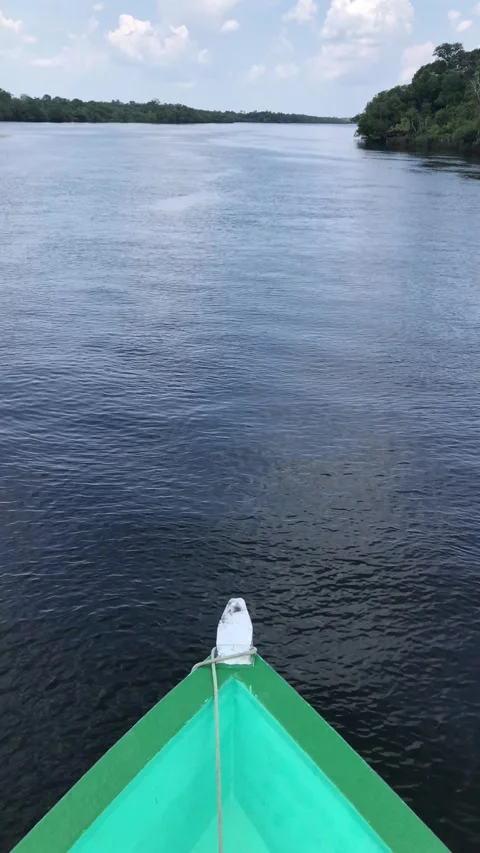 Boat navigating river Видео 299665362