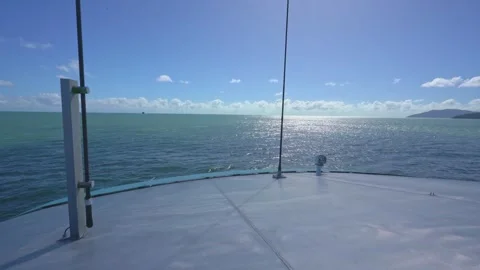 Boat navigating on a sunny ocean day Stock Footage 330547479