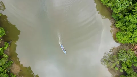 Boat navigating through calm waters in Buenaventura Stock Footage 330278344