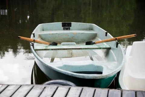 Boat with oars Stock Photos