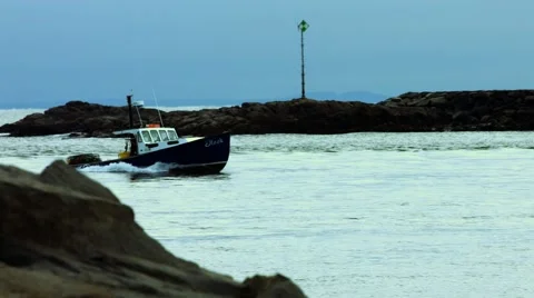 Boat in the Ocean at the Beach During The Winter Stock Footage 45369345