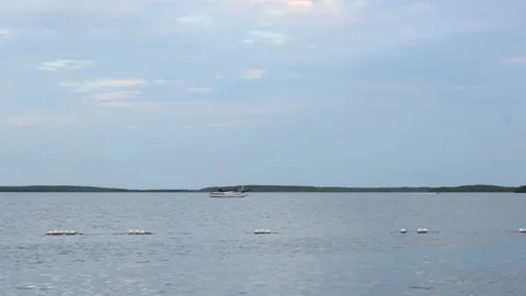 Boat in ocean distance Stock Footage 142611797