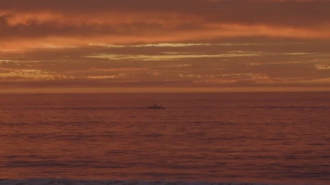 A boat in ocean during sunset 스톡 동영상 103130555