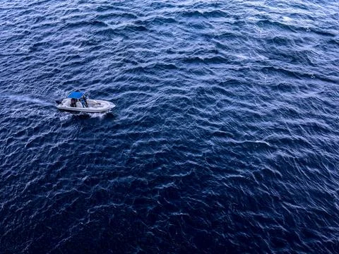 A boat in the ocean. Stock Photos