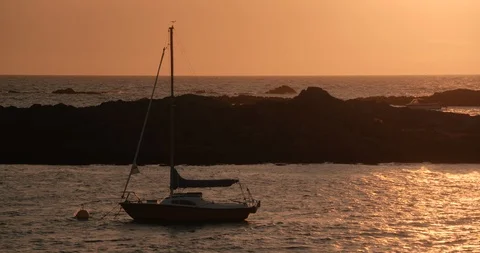 Boat on the ocean sunset Stock Footage 123596548