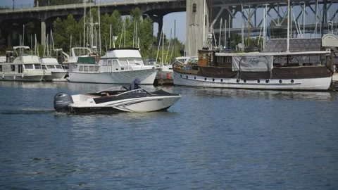 Boat operating by a man in harbor (variant). Stock Footage 157408782
