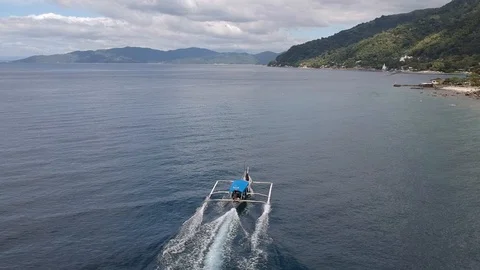 Boat Outrigger Beach Pan Aerial Anilao Batangas Philippines Stock Footage