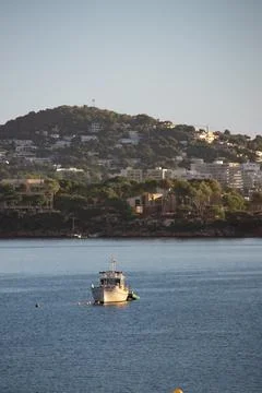 Boat in Palma Nova in the evening  Stock Photos
