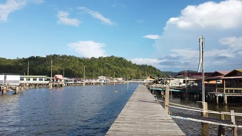 Boat pass through Kampung Ayer or water village Stock-Footage 101088463