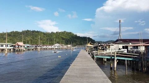 Boat pass through Kampung Ayer or water village Stock-Footage 101088577