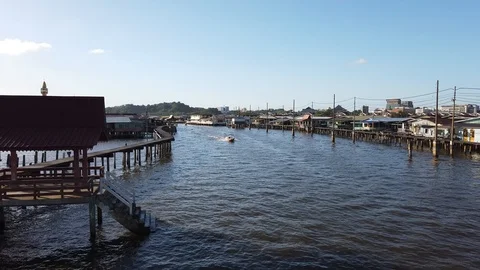 Boat pass through  Kampung Ayer or water village. Stock Footage 101092369