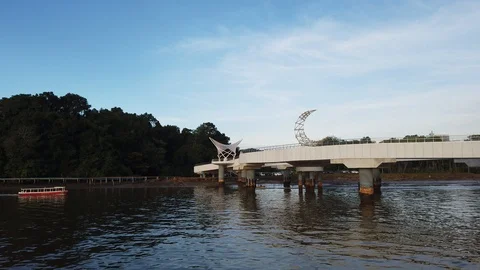 Boat pass through Sultan Omar 'Ali Saifuddien Pedestrian Bridge Stock Footage 100800060
