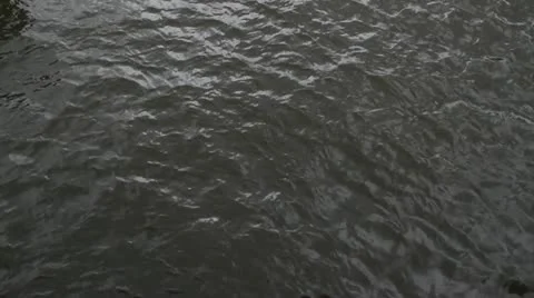 Boat passes under camera on Amsterdam canal Stock Footage 21620713