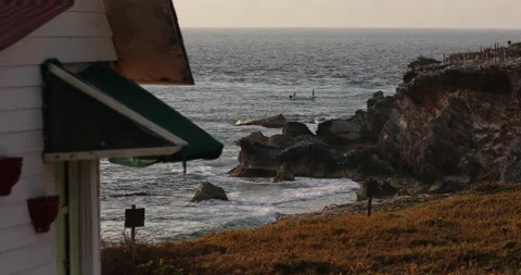 Boat Passing Beyond Cliffs And Building Stock Footage 155909883
