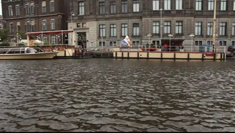 Boat is passing by canal Stock Footage 8663578