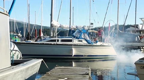 Boat passing by dock, cold, sunny day Stock Footage 58681298