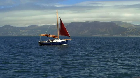 Boat Passing Fast Far Away Land