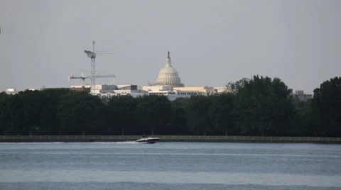 Boat passing in front of the Capitol Building in Washington DC Stock Footage 65218581