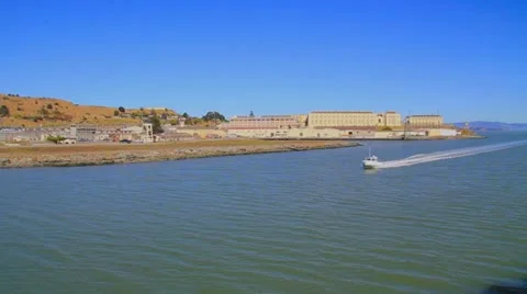 Boat passing in front of San Quentin State Prison in Marin County, California 스톡 동영상 11875975