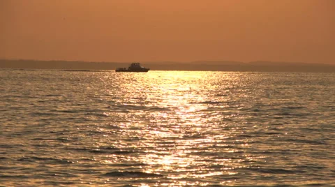 Boat passing by lake or ocean Stock Footage 34418656