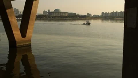 Boat passing over bridge pillar Stock Footage 8928892