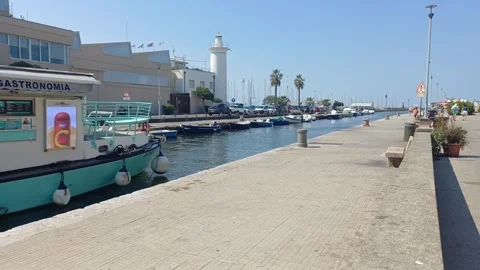 Boat passing in the pier, August 15, 2026, Viareggio, Italy Stock Footage 342322763